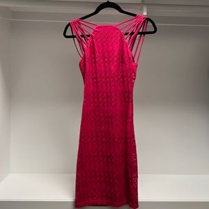 Brand is Mystic from LA. Lower cut back with straps to add accent in the back